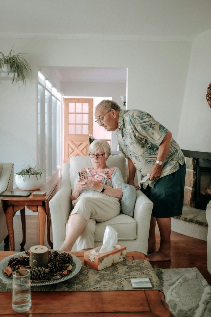 a-woman-and-a-man-in-a-living-room-idbf7a9pn7s